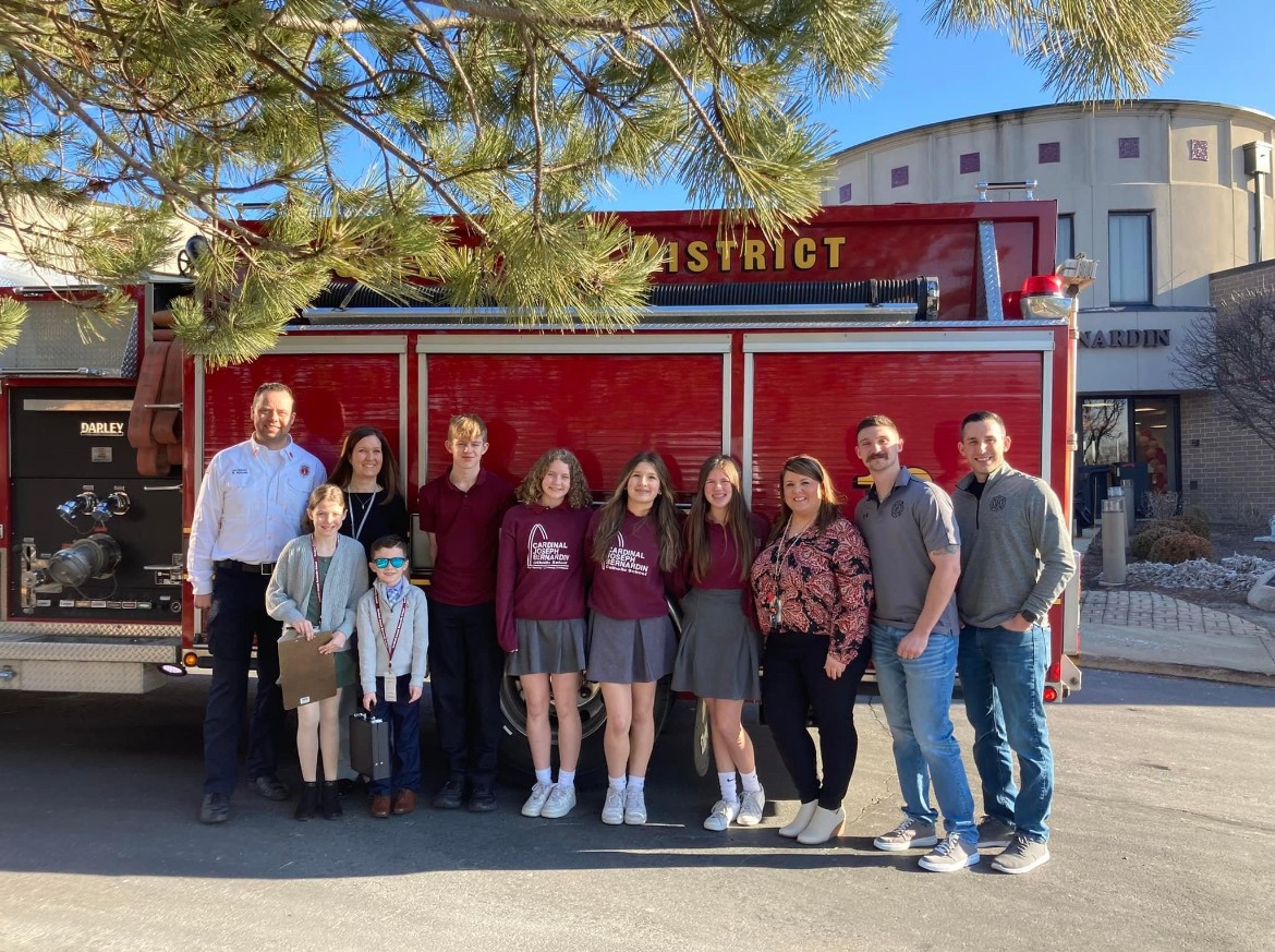 people infront of fire truck