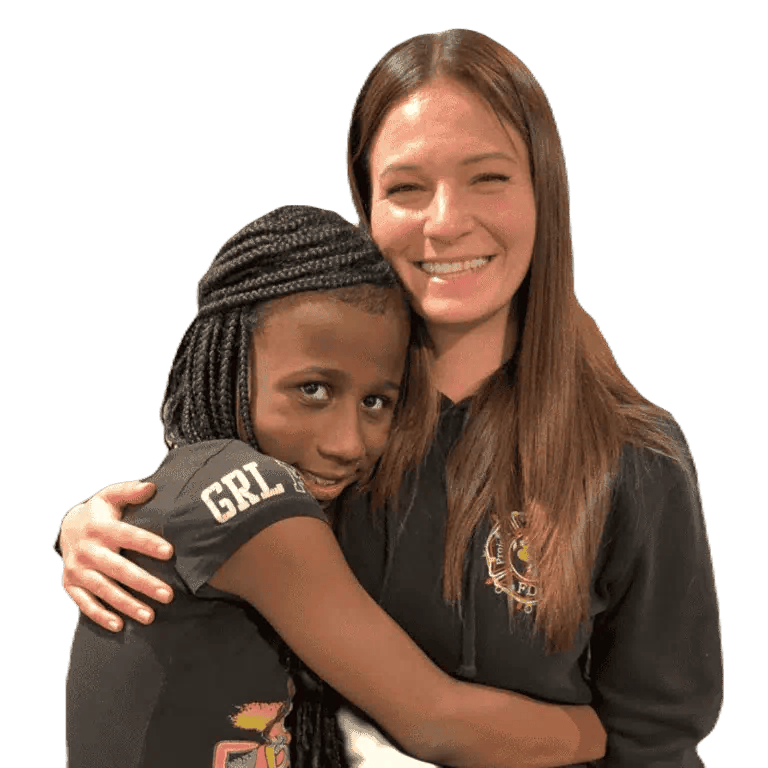 fire fighter hugging child