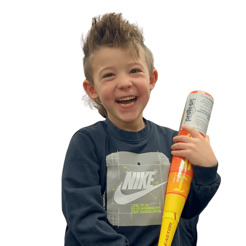 little boy holding baseball bat