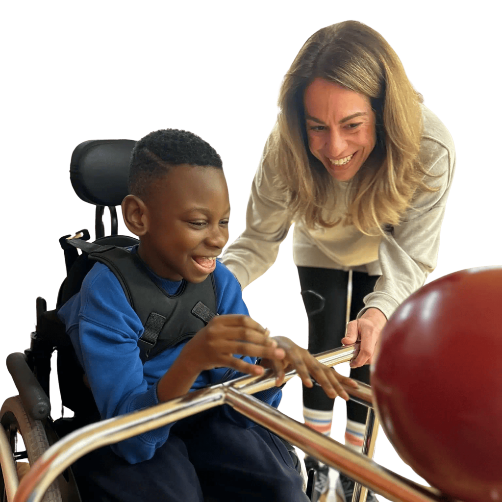 child in wheelchair and lady